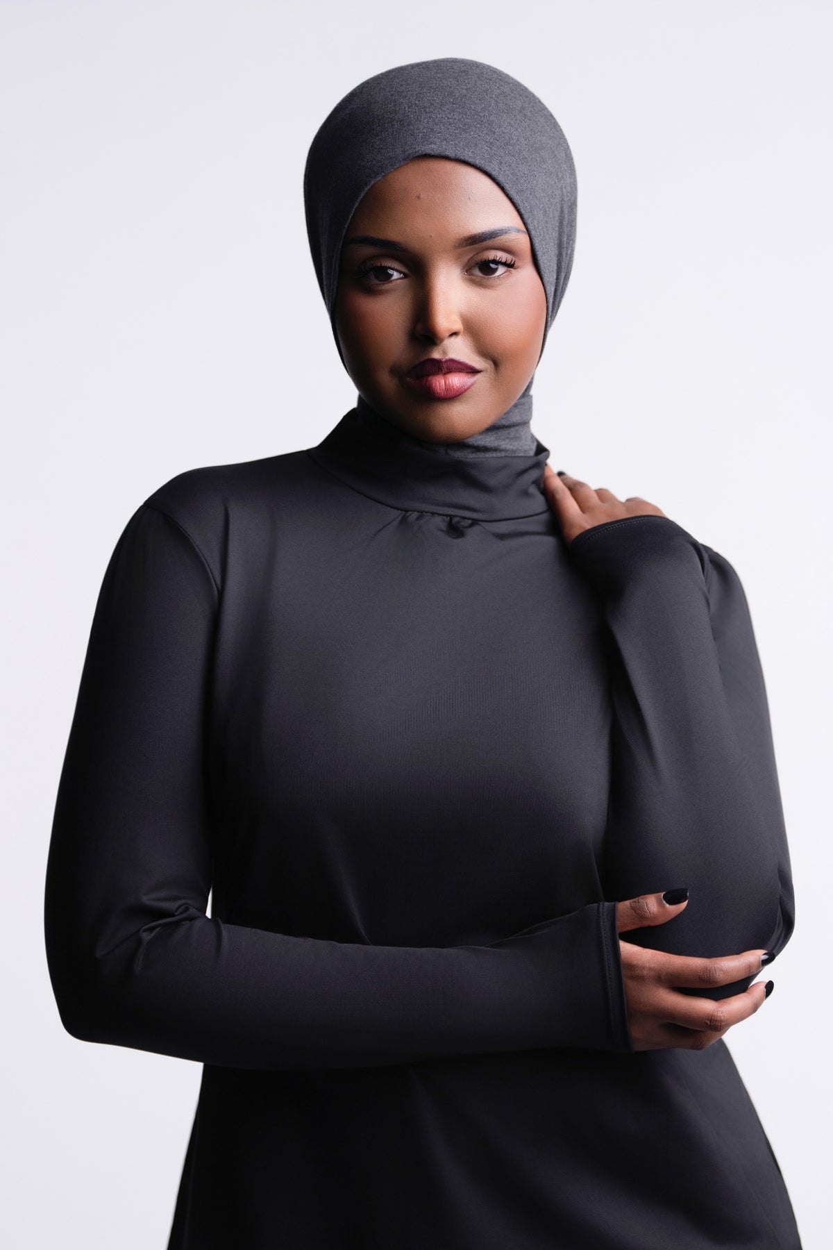 Solo Snap Hijab front view, worn with a black long-sleeve top