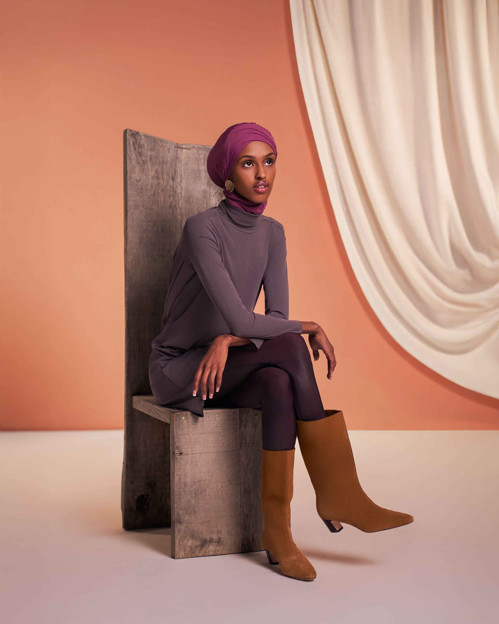 Elegant modest flow tunic with asymmetrical hem paired with snap closure hijab for everyday wear