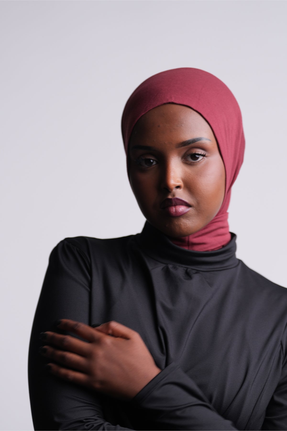 Henna | Solo Snap Hijab front view, worn with a black long-sleeve top