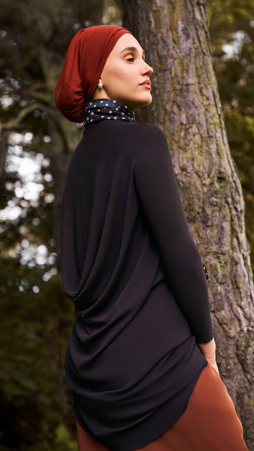 Close-up of 2-in-1 slip-on hijab styled with stretch flow tunic for work and travel