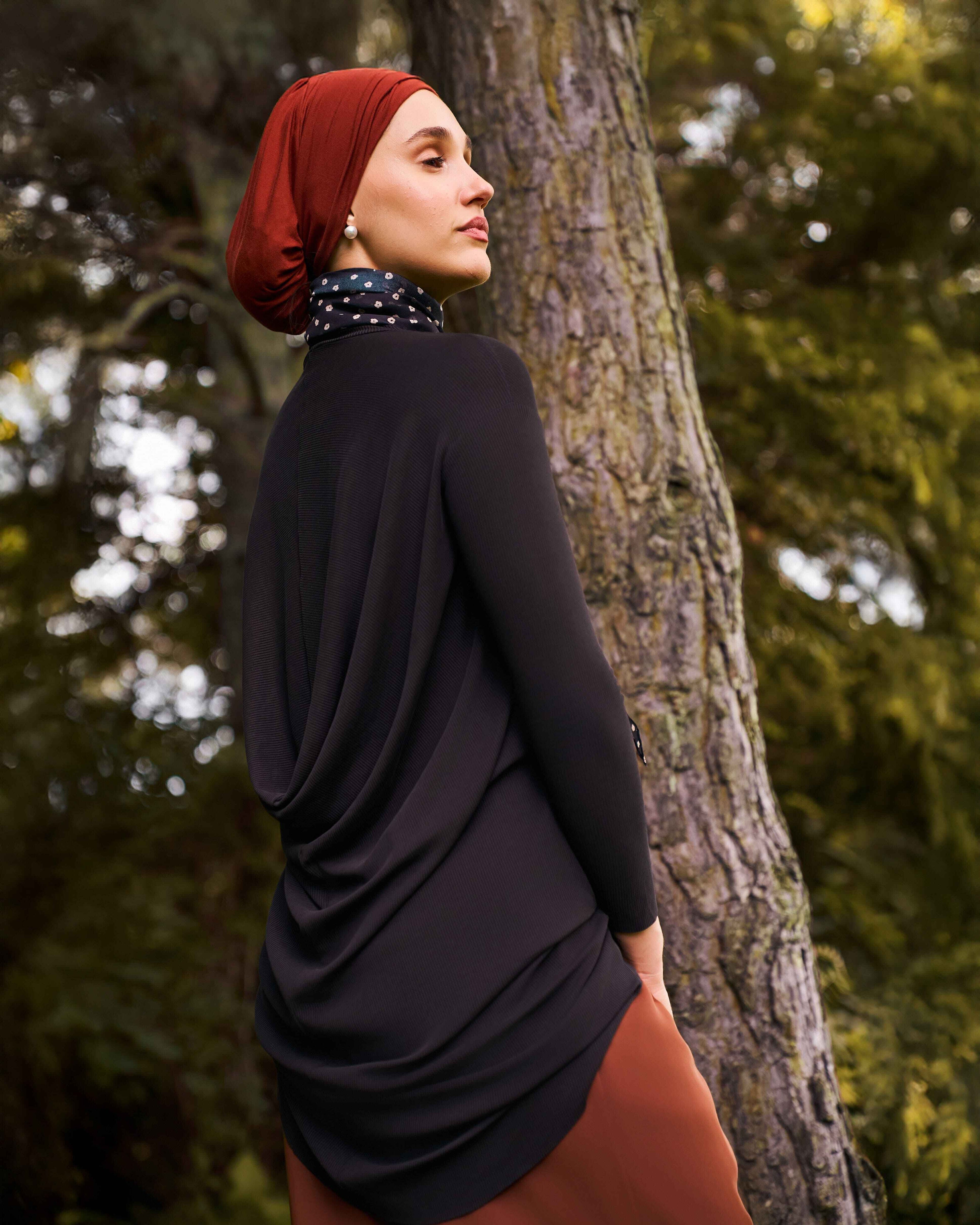 Close-up of 2-in-1 slip-on hijab styled with stretch flow tunic for work and travel