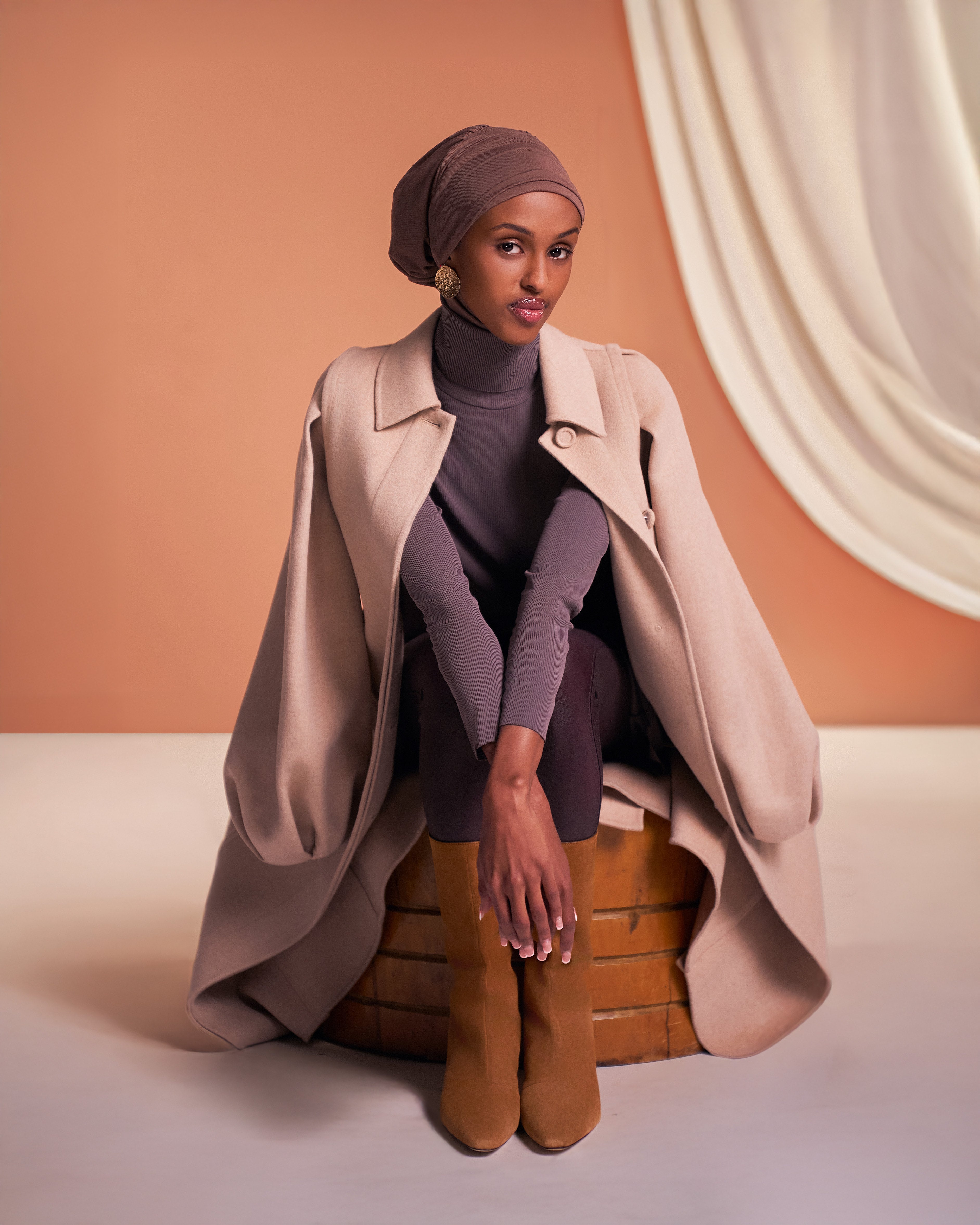 Model is wearing the DuoWear 2-in-1 Hijab in a nude brown with Yalla Flow tunic in mink.