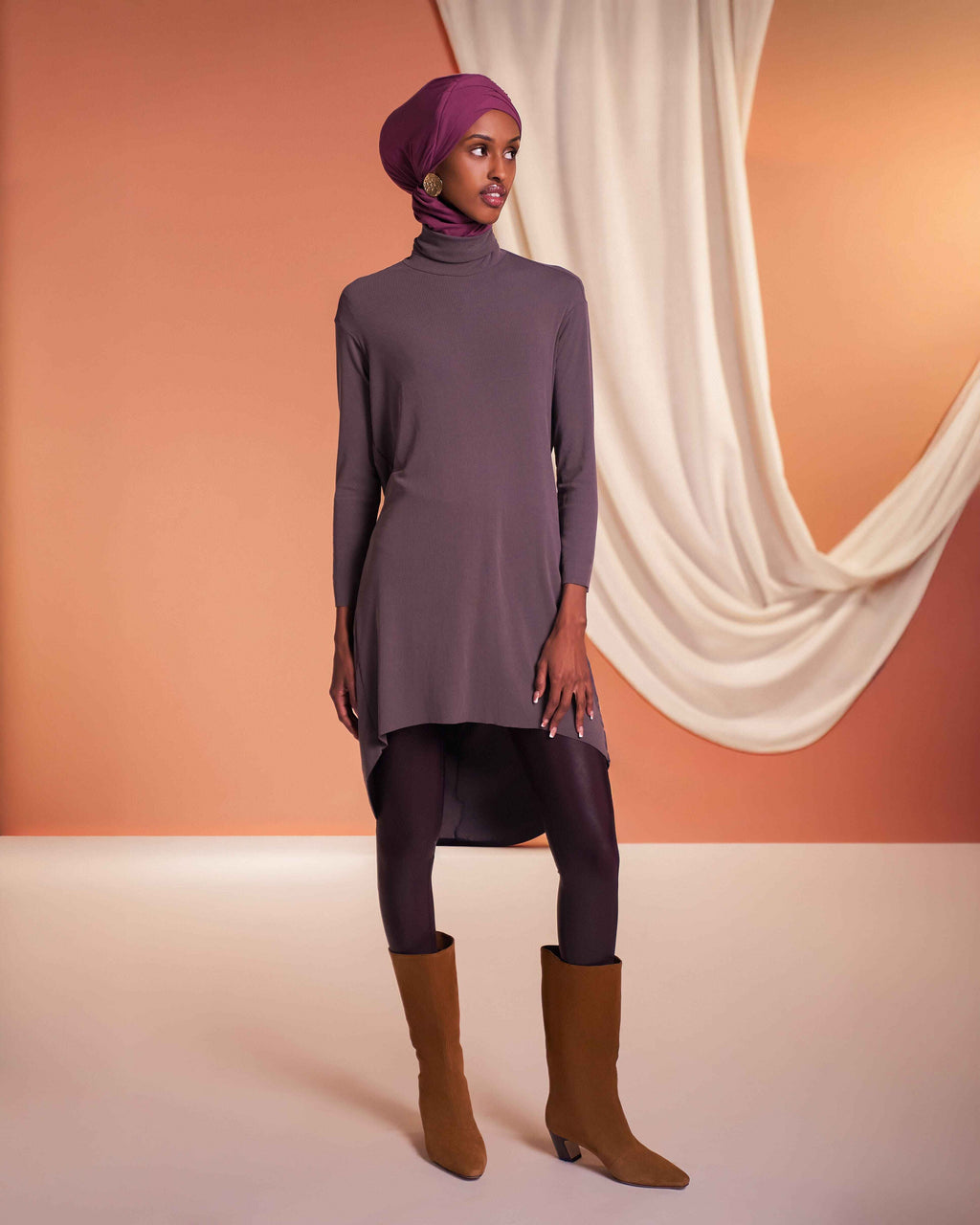 Woman wearing The Signature Yalla Set with flow tunic and matching duo snap hijab in modern modest style